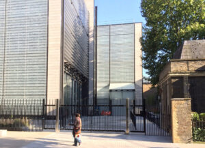 Person with Building and Building